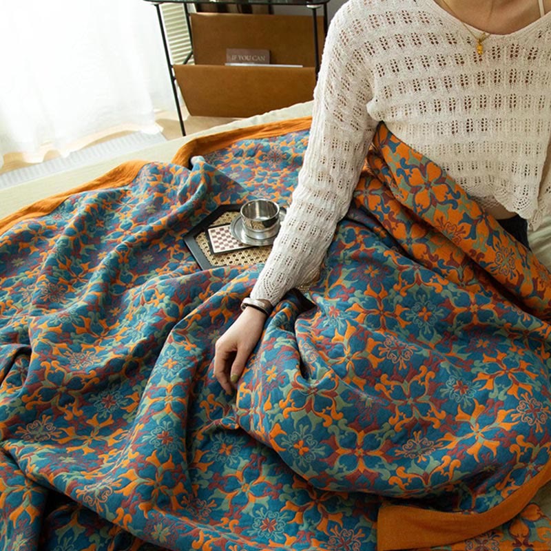 Ethniquilt - Bomuldsquilt med orange og blåt mønster i seks lag