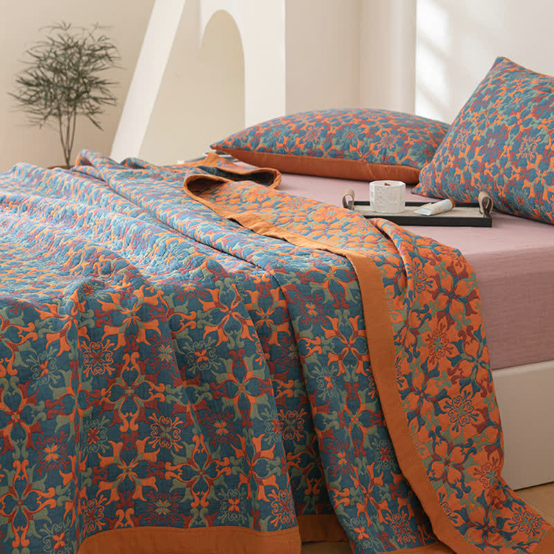 Ethniquilt - Bomuldsquilt med orange og blåt mønster i seks lag