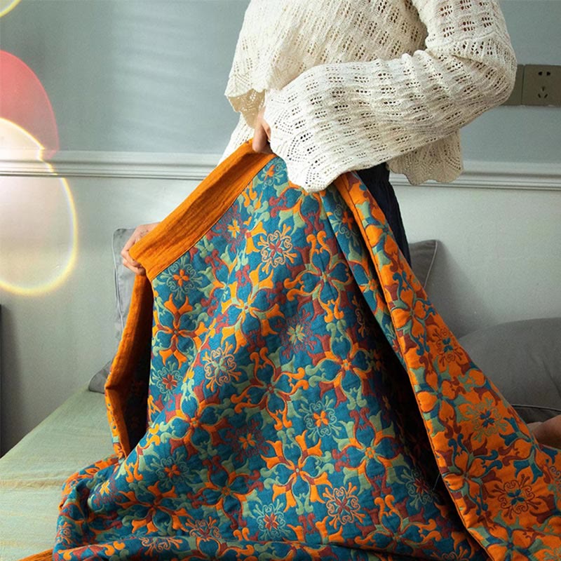 Ethniquilt - Bomuldsquilt med orange og blåt mønster i seks lag