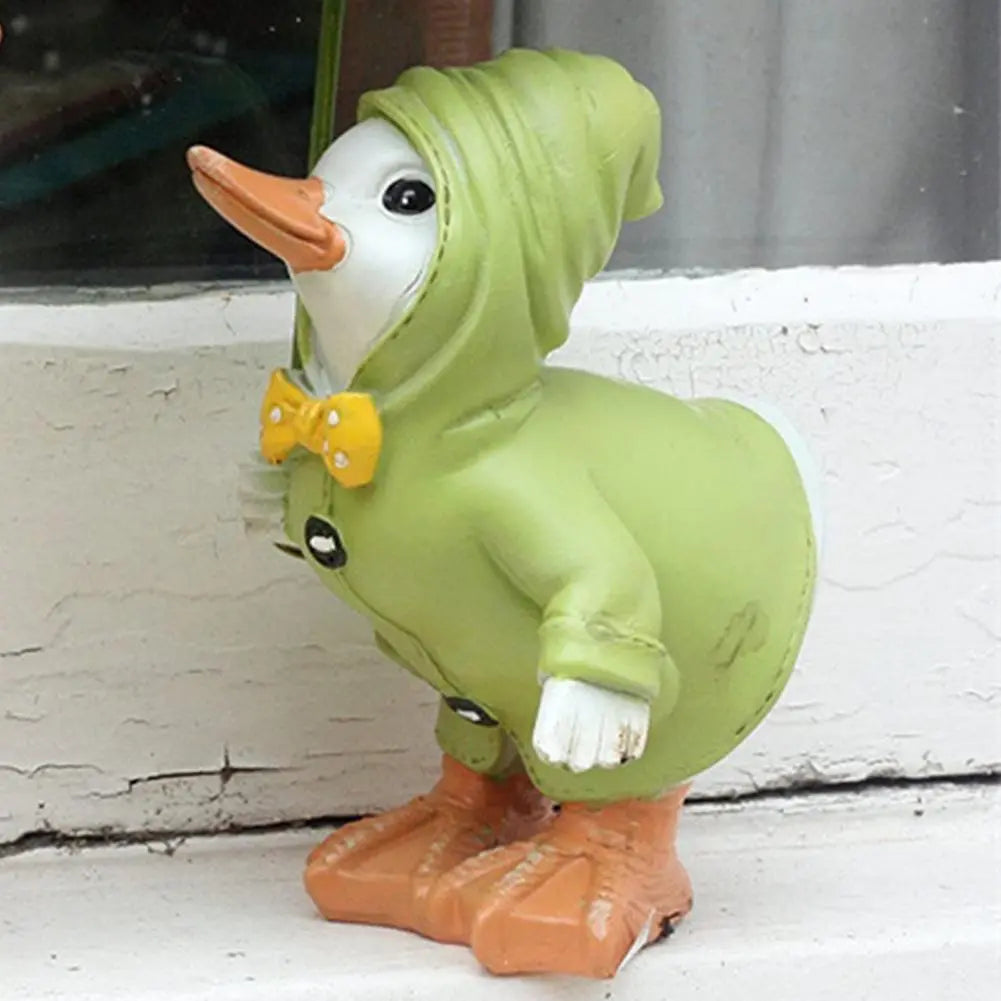 Chique Eend Figur i Regnjakke – Dekorativ Havefigur i Harz til Udendørs Brug, 12 cm x 6 cm, Multifarvet-5